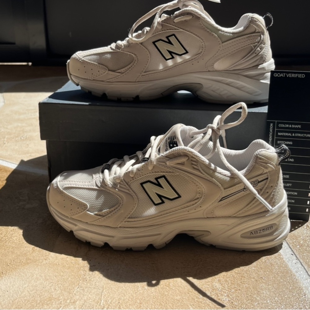 Gently used New Balance 530 in the colorway “Retro Khaki”